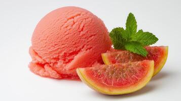 Refreshing Guava Sorbet Scoop with Mint and Guava Slices photo