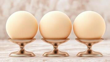 Three Pale Yellow Eggs in Elegant Gold Stands Minimalist Still Life Photography photo