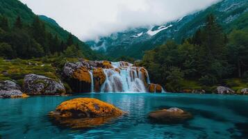 Serene Waterfall Cascading into Turquoise Pool Mountain Landscape Nature photo
