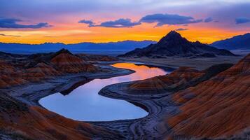 Stunning Sunset over Serpentine Lake and Colorful Canyon Landscape photo