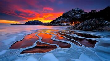 Stunning Frozen Fjord Sunset Ice Patterns Mountains and Vibrant Sky photo