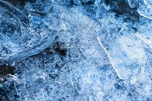 blue ice with visible details and interesting texture photo