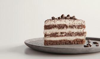 A slice of cake with a layer of chocolate and a layer of coffee on top photo