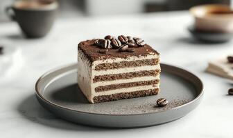 A slice of cake with a layer of chocolate and coffee on top photo