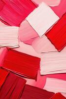 Dynamic abstract composition featuring textured paint strokes in vibrant red and blush pink for creative projects and backgrounds photo