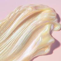 Iridescent pearly cream texture with a holographic glow. Soft streaks reflect pastel hues, creating an ethereal, luminous effect. Ideal for skincare and beauty product visuals photo