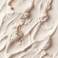 Pastel pink ice cream with a soft, creamy texture. The delicate hue and smooth consistency make it a tempting frozen treat. Light airy swirls enhance its appealing appearance photo