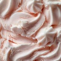 Creamy white ice cream with delicate pink swirls, adding a subtle fruity flavor. The intricate patterns and smooth texture make it a delightful and elegant frozen dessert photo