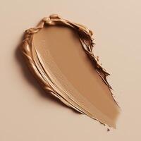 A deep espresso-colored foundation swatch with a smooth, creamy consistency. The even application highlights the formulas full coverage and rich, hydrating texture, creating a natural satin finish photo