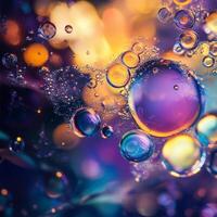 A macro view of iridescent bubbles forming an organic pattern on a liquid surface. Light reflections create a vibrant mix of blue, purple, and gold tones, enhancing the abstract texture photo