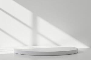 An one step white round podium in a white room with a window light projecting a shadow on the wall photo