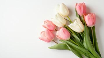 Delicate arrangement of soft pastel tulips on a neutral background for spring decoration photo