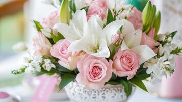 Beautiful delicate floral arrangement in a vintage vase enhancing a charming table setting in a cozy interior space photo
