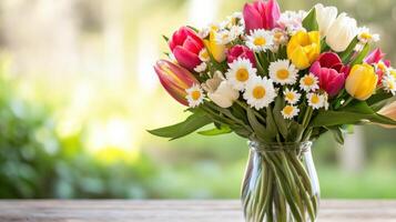 Bright and cheerful bouquet of tulips and daisies on a rustic wooden table in a sunlit garden photo