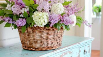 Floral centerpiece on an old wooden table with peeling paint adds charm to a cozy home setting photo