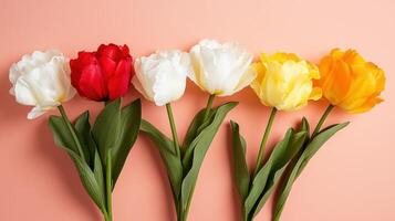 Bright and vibrant floral arrangement featuring six tulips in various colors on a soft background photo