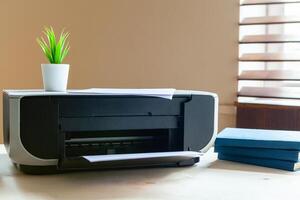 Close up of an office table with printer on it photo