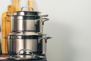 Set of cookware utensils on a kitchen counter photo