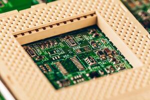 Computer electronic circuit board with processor close up photo