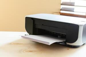 Close up of an office table with printer on it photo