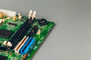 Computer electronic circuit board with processor close up photo