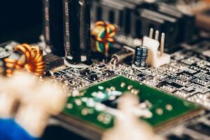 Computer electronic circuit board with processor close up photo