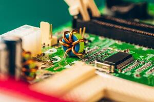 Computer electronic circuit board with processor close up photo