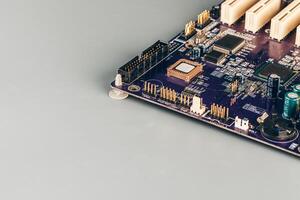 Computer electronic circuit board with processor close up photo