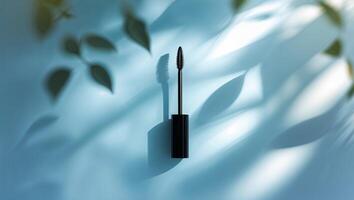 Mascaras arranged artistically with soft shadows on a blue background during daylight photo