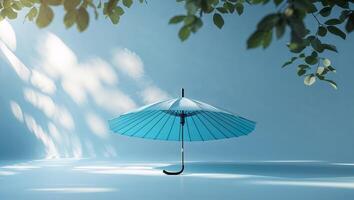 Bright blue umbrella on a serene background illuminated by soft natural light photo