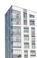 Modern architecture, tall building in urban metropolis. Residential condo with geometric structure, photo