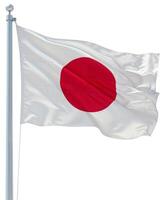 Flag of Japan waving on a flagpole isolated on white background photo