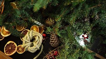Details for making a New Year wreath lie on the table video