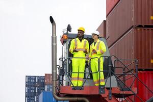 Dock Worker Team in Safety Gear at Industrial Site, Container Yard Workers Discussion at Shipping Yard photo
