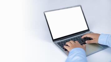 Mockup screen blank, Workspace white background new project on laptop computer with blank copy space screen for your advertising text message, Laptop with blank screen and placed on a black table. photo