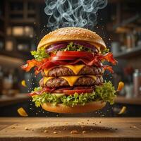 flying Large mouth watering burger with two sesame buns and layers of beef patties, cheese, vegetables and bacon looks very attractive. In background, interior of a cafe with French fries. photo