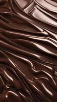 Smooth flowing melted chocolate texture with glossy surface and rich brown color, abstract liquid background pattern photo