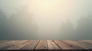 Rustic wooden table with foggy forest background and copy space. Empty planks with natural texture for product display, design, or backdrop photo