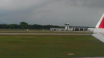 First person view of an airplane wing during takeoff. Airliner gaining speed and taking off video