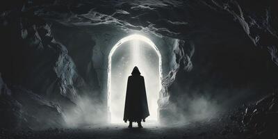 Mysterious figure standing before a glowing portal in a cave setting at twilight photo