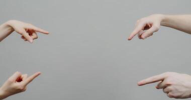 Four hands pointing at each other video