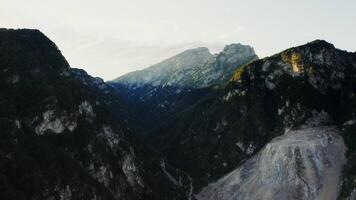 A river winds through the vast mountain range. video