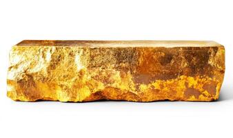 Large gold bar resting on a clean white surface photo