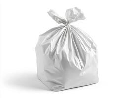 White garbage bag filled with waste standing on a clean surface photo