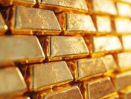 Glimmering gold bars stacked neatly in a storage room photo