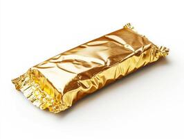 Chocolate bar wrapped in shiny golden foil on white background photo