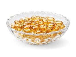 Nutritional supplement capsules in a decorative glass bowl photo