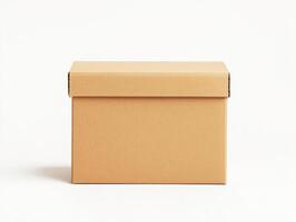 Cardboard box sitting on a plain surface in a bright setting photo