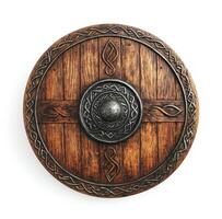 Wooden shield with intricate carvings displayed on a white background photo