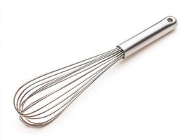 Whisk made of stainless steel used in cooking and baking tasks photo